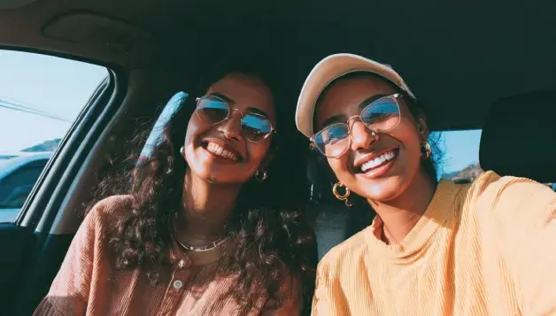 Two BlaBlaCar members saving money by carpooling