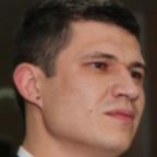 Николай