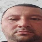 Комил