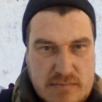 Николай